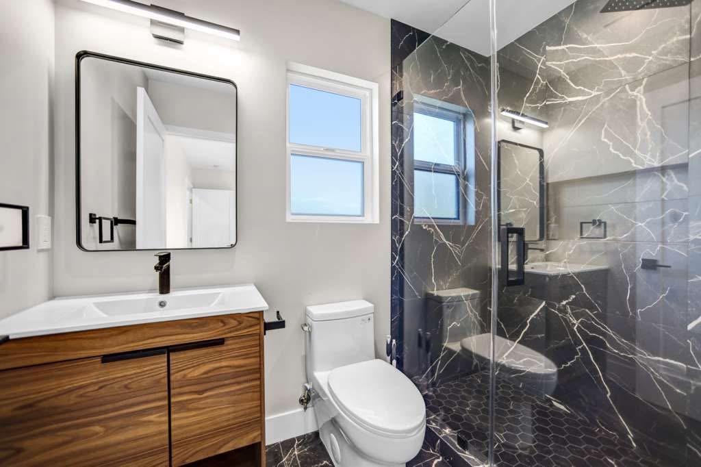 Custom tile shower and vanity remodel